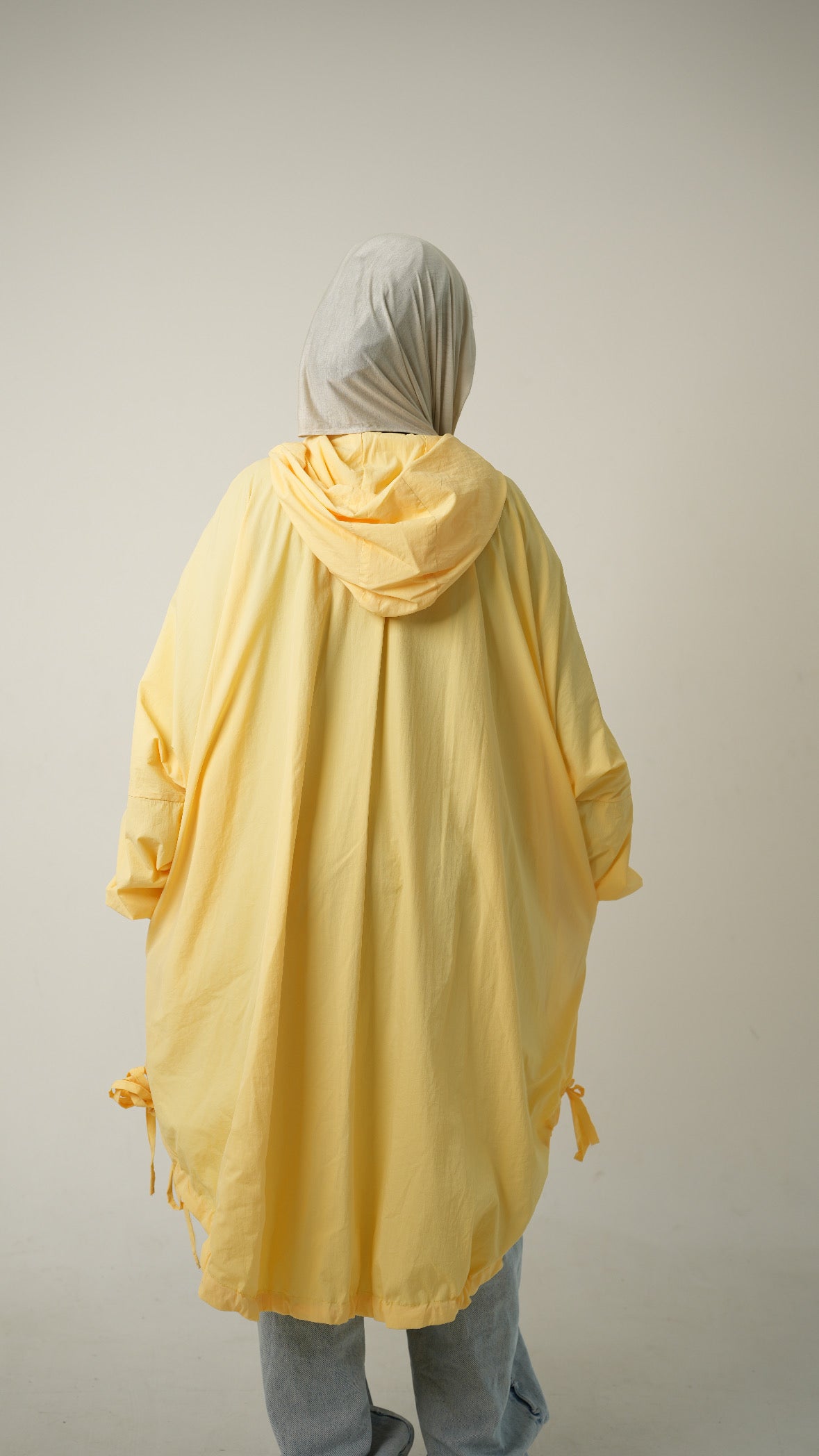 Hooded Waterproof jacket in butter yellow