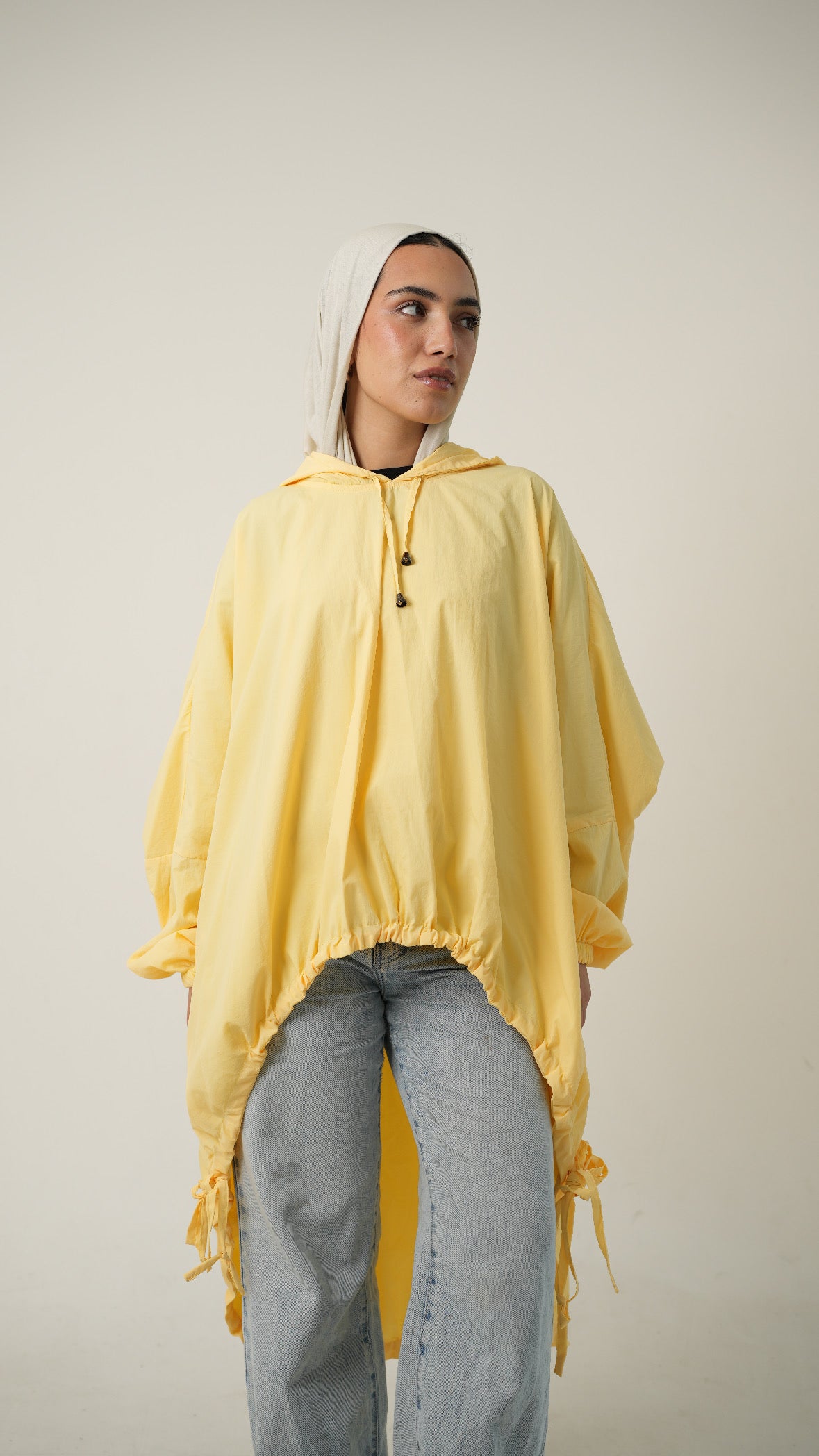 Hooded Waterproof jacket in butter yellow