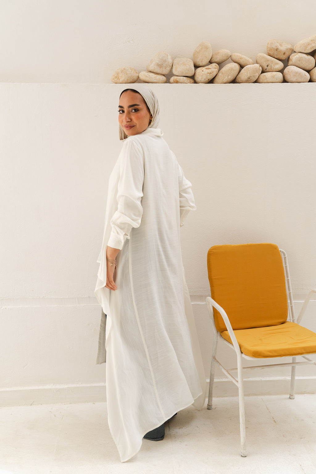 All Around Asymmetric Top in White